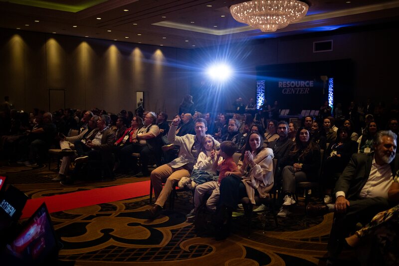 Law firm owners and families cheering in the audience at the 2026 Law Firm 500 awards ceremony