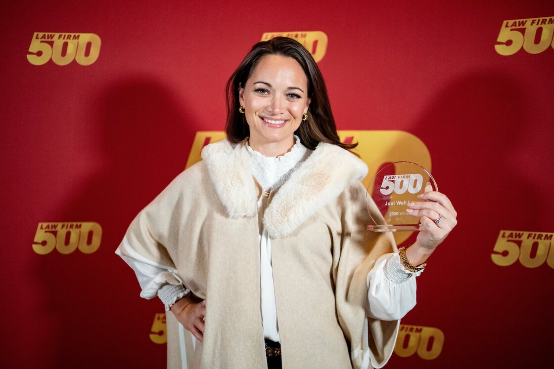 Just Well Law smiling with its number one 2026 Law Firm 500 winner award